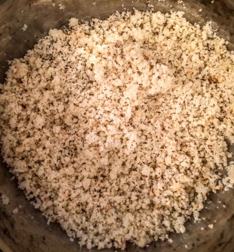 Mix the cauliflower rice with the herbs and Parmesan.